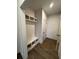 Entryway with built-in bench and storage at 500 Chiswick Cir, Alpharetta, GA 30009