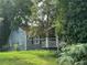 Ranch style home with blue siding and a covered porch at 1417 Graymont Sw Dr, Atlanta, GA 30310