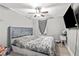 Spacious bedroom with large bed and ceiling fan at 1324 Almont Sw Dr, Atlanta, GA 30310