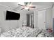 Bedroom with a large bed and flat screen TV at 1324 Almont Sw Dr, Atlanta, GA 30310