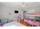 Bedroom with a double bed, bunk beds, and hardwood floors at 1324 Almont Sw Dr, Atlanta, GA 30310