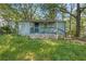 House with a porch and a large yard at 1324 Almont Sw Dr, Atlanta, GA 30310