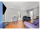 Living room with hardwood floors and open floor plan at 1324 Almont Sw Dr, Atlanta, GA 30310