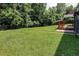 Spacious backyard with deck and grassy area, perfect for outdoor enjoyment at 1544 Childress Sw Dr, Atlanta, GA 30311
