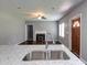 Modern kitchen with stainless steel sink and granite countertops at 1544 Childress Sw Dr, Atlanta, GA 30311