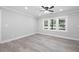 Bright living room featuring hardwood floors and large windows at 2595 Creekview Sw Dr, Marietta, GA 30008