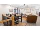 Open concept basement with dining and living areas at 304 Woodstock Seven Dr, Woodstock, GA 30188