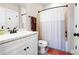 Basement bathroom with shower/tub combo at 304 Woodstock Seven Dr, Woodstock, GA 30188