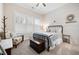 Cozy bedroom with shiplap accent wall and metal bed frame at 304 Woodstock Seven Dr, Woodstock, GA 30188