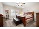 Spacious bedroom with King-size bed and dresser at 304 Woodstock Seven Dr, Woodstock, GA 30188
