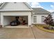 Attached two-car garage with ample space for vehicles and storage at 304 Woodstock Seven Dr, Woodstock, GA 30188