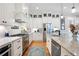Spacious kitchen featuring granite countertops, stainless steel appliances, and ample cabinetry at 304 Woodstock Seven Dr, Woodstock, GA 30188