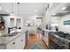 Modern kitchen with stainless steel appliances and granite countertops at 304 Woodstock Seven Dr, Woodstock, GA 30188
