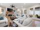 Living room with fireplace, hardwood floors, and access to backyard at 304 Woodstock Seven Dr, Woodstock, GA 30188