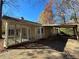 House exterior with screened porch and carport at 5090 Great Meadows Rd, Lithonia, GA 30038