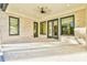 Covered back patio with brick pavers and access to the backyard at 816 Hillwood Dr, Marietta, GA 30068