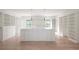 Large walk-in closet with center island, custom built-ins and ample storage at 816 Hillwood Dr, Marietta, GA 30068