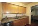 Updated kitchen, featuring granite countertops and ample wood cabinetry at 1150 Collier Nw Rd # 4B, Atlanta, GA 30318