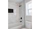 Clean bathroom with a bathtub, shower, and marble tile at 1930 Pinedale Nw Dr, Atlanta, GA 30314