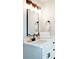 Bathroom with modern vanity, black matte fixtures, and a large mirror at 1930 Pinedale Nw Dr, Atlanta, GA 30314