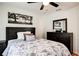 Bright bedroom featuring a dresser and a comfy bed with floral bedding at 1930 Pinedale Nw Dr, Atlanta, GA 30314