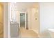 Bathroom features double vanity, walk-in shower, and soaking tub at 1621 Fuma Leaf Way, Mcdonough, GA 30253