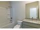 Bathroom with granite countertop, shower/tub combo, and toilet at 1621 Fuma Leaf Way, Mcdonough, GA 30253