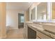 Elegant bathroom with double vanity, granite countertop and large mirrors at 1621 Fuma Leaf Way, Mcdonough, GA 30253