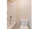 Bathroom with a toilet, shower/tub combo, and shelving at 1621 Fuma Leaf Way, Mcdonough, GA 30253