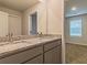 Double vanity bathroom with granite countertops at 1621 Fuma Leaf Way, Mcdonough, GA 30253