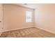 Bright bedroom with neutral walls, carpet and window at 1621 Fuma Leaf Way, Mcdonough, GA 30253