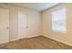 Simple bedroom with carpet and window at 1621 Fuma Leaf Way, Mcdonough, GA 30253