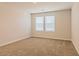 Spacious bedroom with carpeted floors and window blinds at 1621 Fuma Leaf Way, Mcdonough, GA 30253