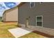 Home exterior showcasing a patio and gray siding at 1621 Fuma Leaf Way, Mcdonough, GA 30253