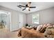 Cozy bedroom with a queen-size bed and access to another room at 4742 West Dr, Forest Park, GA 30297