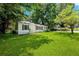 Spacious front yard with lush green grass at 4742 West Dr, Forest Park, GA 30297