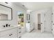 Modern bathroom with double vanity and large mirror at 648 Liella Se Park, Atlanta, GA 30312