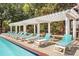 Inviting pool area with multiple lounge chairs and pergola at 375 Ralph Mcgill Blvd # 603, Atlanta, GA 30312