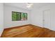 Bright bedroom with hardwood floors and large window at 1112 Warrenhall Ne Ln, Brookhaven, GA 30319