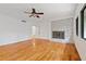 Living room featuring hardwood floors and fireplace at 1112 Warrenhall Ne Ln, Brookhaven, GA 30319