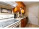 Modern kitchen with granite counters and wood cabinets at 1273 Branch Dr, Tucker, GA 30084