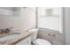 Clean bathroom with granite countertop and updated fixtures at 2707 Crescendo Nw Dr, Atlanta, GA 30318