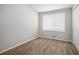 Bright bedroom with neutral carpeting and large window at 2707 Crescendo Nw Dr, Atlanta, GA 30318