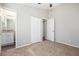 Bedroom with carpet, ceiling fan, and ample closet space at 2707 Crescendo Nw Dr, Atlanta, GA 30318