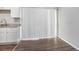 Bright dining area with vinyl flooring and access to patio at 2707 Crescendo Nw Dr, Atlanta, GA 30318