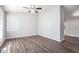 Spacious dining area with wood-look flooring and ceiling fan at 2707 Crescendo Nw Dr, Atlanta, GA 30318