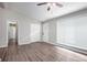Bright living room with hardwood floors and access to hallway at 2707 Crescendo Nw Dr, Atlanta, GA 30318