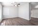 Living room with wood-look flooring and ceiling fan at 2707 Crescendo Nw Dr, Atlanta, GA 30318