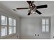 Bright bedroom with ceiling fan and plantation shutters at 5530 Highland Preserve Dr, Mableton, GA 30126