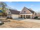 Two-story house with stone accents and a large front porch at 111 Legends Way, Hiram, GA 30141